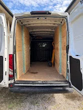 Furniture loaded and secured inside a Man and Van Brisbane vehicle